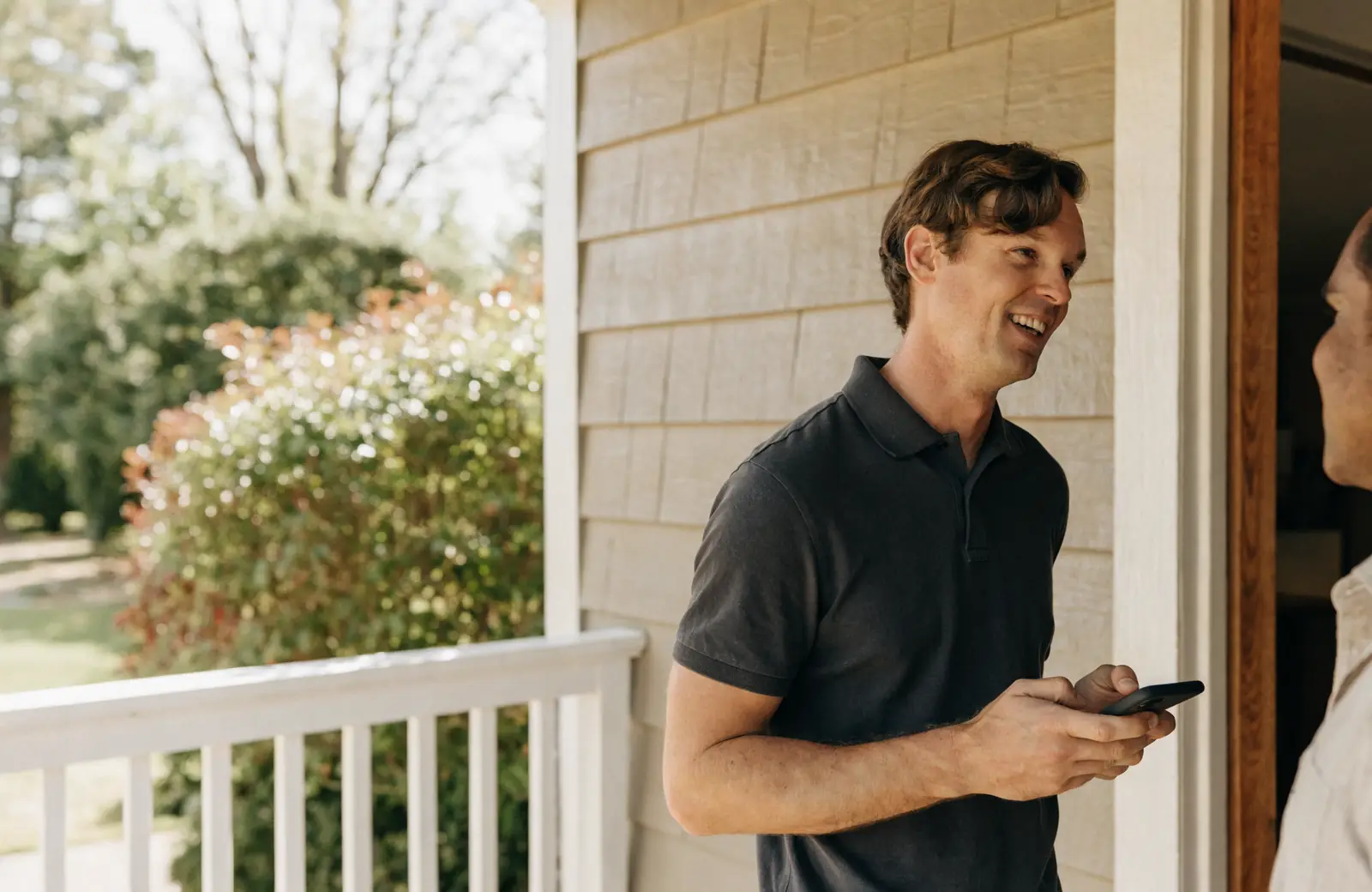 A rep logging a visit on the doorstep